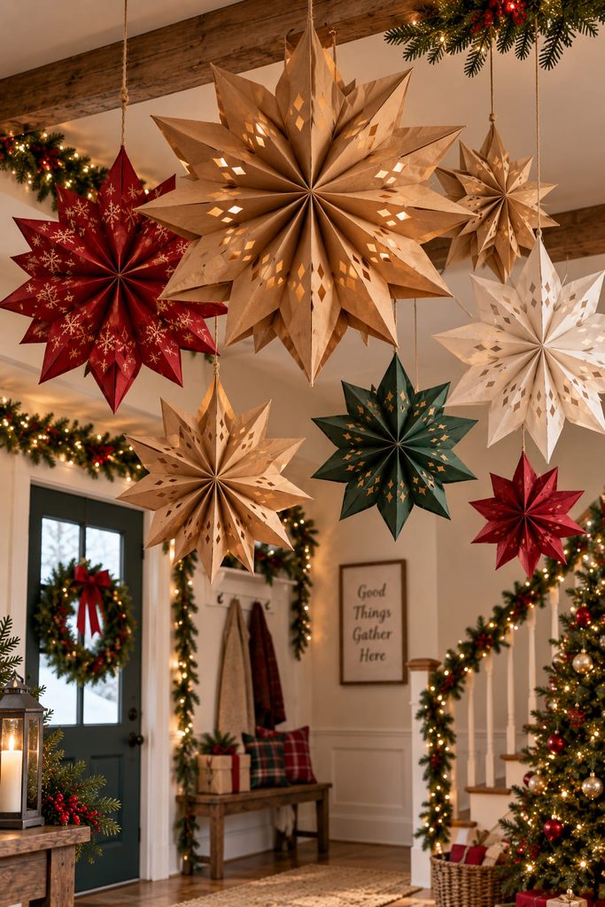 Large paper bag stars suspended at varied heights in a Christmas ceiling canopy.